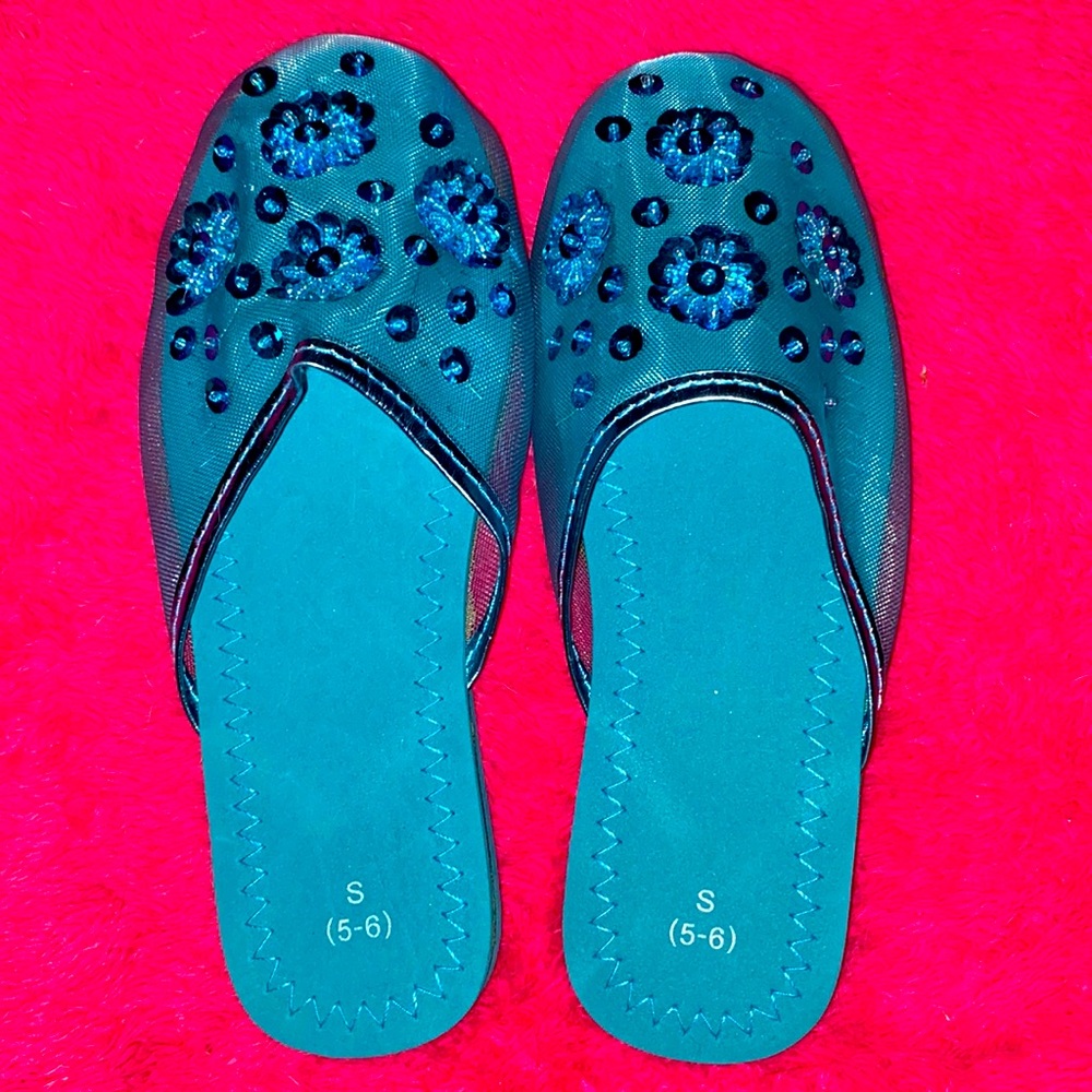 Ladies sequence slippers never been worn.